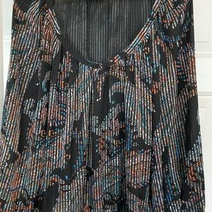 Such a great blouse. Size Large. Lightweight and goes with so much.